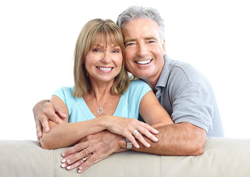Senior Happy Couple With Dental Implants From Livonia Laser Dentistry